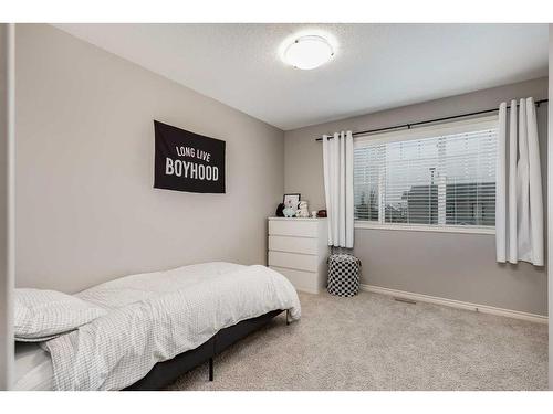 2587 Reunion Square Nw, Airdrie, AB - Indoor Photo Showing Bedroom