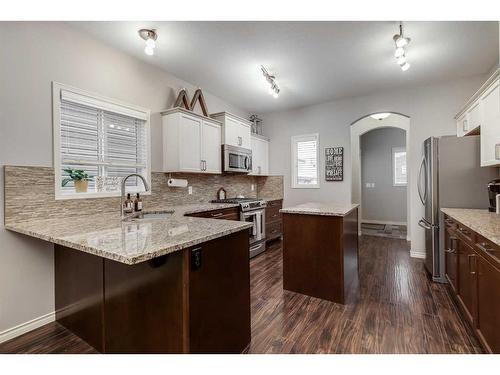 2587 Reunion Square Nw, Airdrie, AB - Indoor Photo Showing Kitchen With Upgraded Kitchen