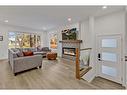 4216 Chippewa Road Nw, Calgary, AB  - Indoor Photo Showing Living Room With Fireplace 