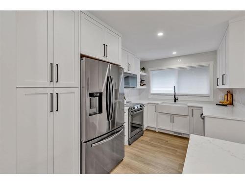 4216 Chippewa Road Nw, Calgary, AB - Indoor Photo Showing Kitchen With Stainless Steel Kitchen