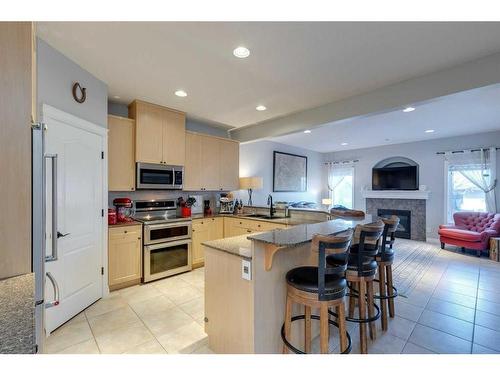 2808 30 Street Sw, Calgary, AB - Indoor Photo Showing Kitchen With Fireplace