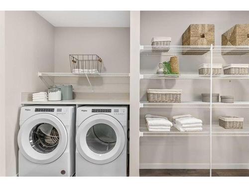 80 Magnolia Green Se, Calgary, AB - Indoor Photo Showing Laundry Room