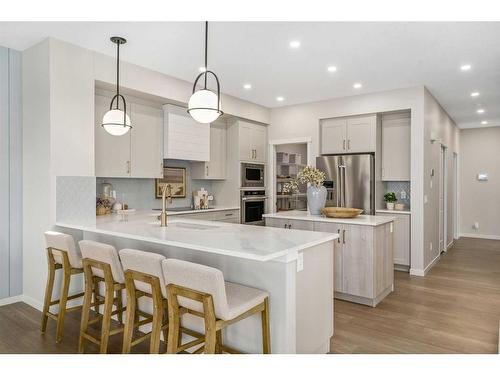 80 Magnolia Green Se, Calgary, AB - Indoor Photo Showing Kitchen With Stainless Steel Kitchen With Upgraded Kitchen