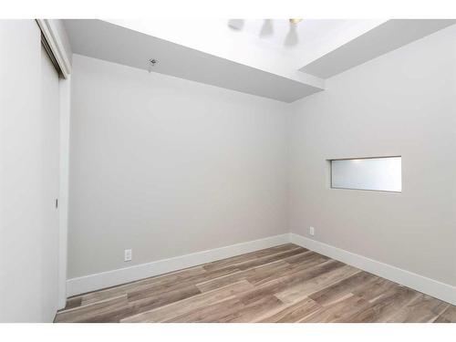 314-1087 2 Avenue Nw, Calgary, AB - Indoor Photo Showing Other Room