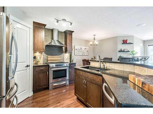 75 Cranford Crescent Se, Calgary, AB - Indoor Photo Showing Kitchen With Double Sink