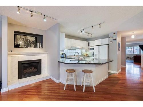 3007 29 Street Sw, Calgary, AB - Indoor With Fireplace