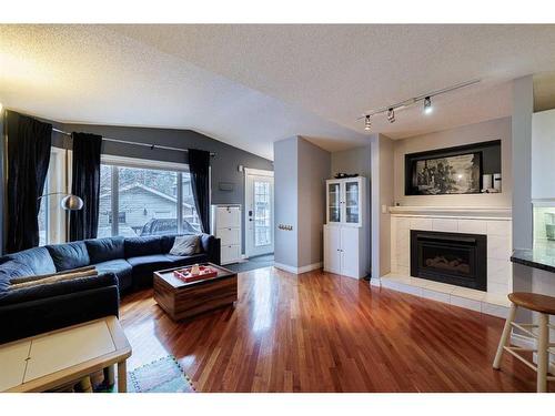 3007 29 Street Sw, Calgary, AB - Indoor Photo Showing Living Room With Fireplace