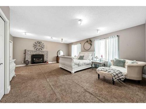 701 9 Street Se, High River, AB - Indoor Photo Showing Living Room With Fireplace