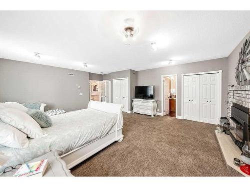 701 9 Street Se, High River, AB - Indoor Photo Showing Bedroom