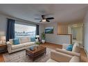 106 Huntham Place Ne, Calgary, AB  - Indoor Photo Showing Living Room 