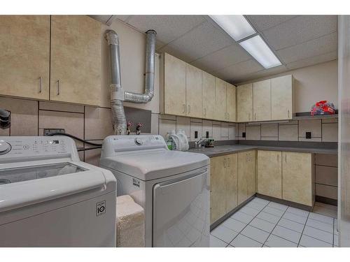 106 Huntham Place Ne, Calgary, AB - Indoor Photo Showing Laundry Room