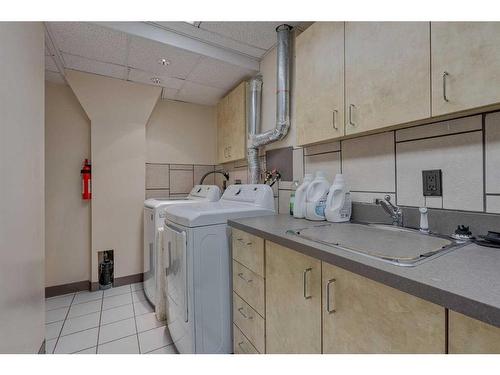 106 Huntham Place Ne, Calgary, AB - Indoor Photo Showing Laundry Room