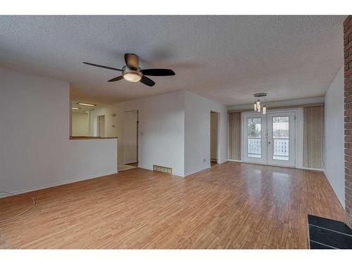 106 Huntham Place Ne, Calgary, AB - Indoor With Fireplace