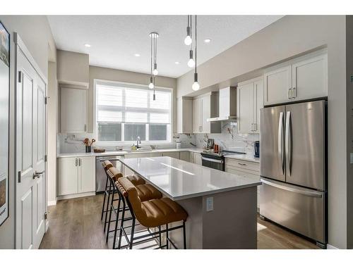 1119 Mahogany Boulevard Se, Calgary, AB - Indoor Photo Showing Kitchen With Upgraded Kitchen