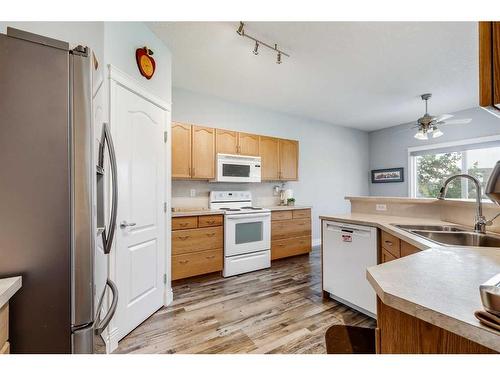 358 Sagewood Gardens Sw, Airdrie, AB - Indoor Photo Showing Kitchen With Double Sink