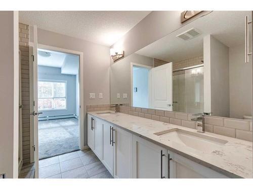 102-4150 Seton Drive Se, Calgary, AB - Indoor Photo Showing Bathroom