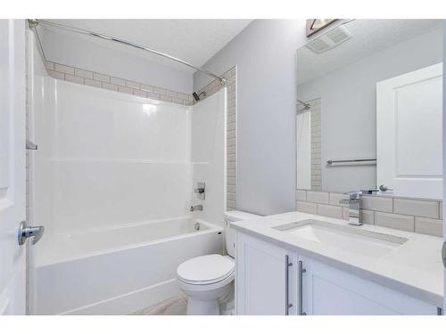 102-4150 Seton Drive Se, Calgary, AB - Indoor Photo Showing Bathroom