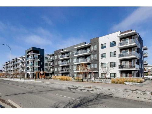 102-4150 Seton Drive Se, Calgary, AB - Outdoor With Facade