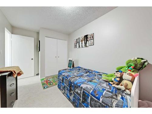 415 Midridge Drive Se, Calgary, AB - Indoor Photo Showing Bedroom