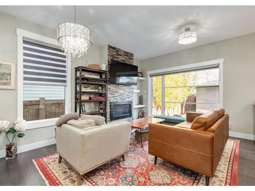 5232 Bowness Road Nw, Calgary, AB - Indoor Photo Showing Living Room With Fireplace