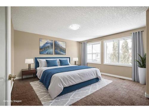 15 Silverado Skies Manor Sw, Calgary, AB - Indoor Photo Showing Bedroom