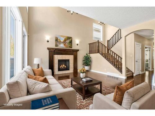 15 Silverado Skies Manor Sw, Calgary, AB - Indoor Photo Showing Living Room With Fireplace