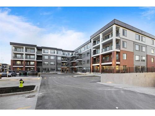 3403-111 Wolf Creek Drive Se, Calgary, AB - Outdoor With Balcony With Facade