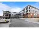 3403-111 Wolf Creek Drive Se, Calgary, AB  - Outdoor With Balcony With Facade 