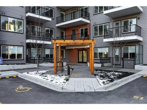 3403-111 Wolf Creek Drive Se, Calgary, AB - Outdoor With Balcony With Facade