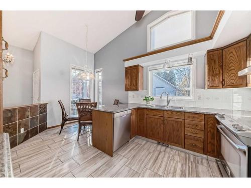 60 Douglasview Park Se, Calgary, AB - Indoor Photo Showing Kitchen With Double Sink