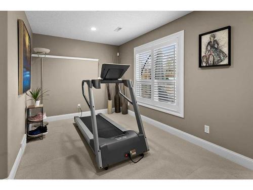 162 Rockyspring Circle Nw, Calgary, AB - Indoor Photo Showing Gym Room