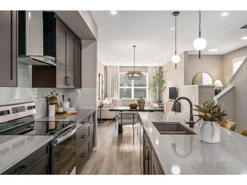 1121 Mahogany Boulevard Se, Calgary, AB - Indoor Photo Showing Kitchen With Double Sink With Upgraded Kitchen