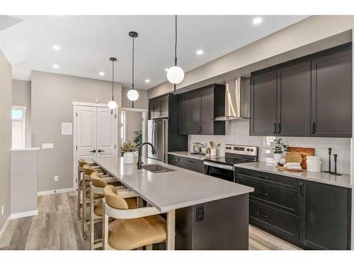 1121 Mahogany Boulevard Se, Calgary, AB - Indoor Photo Showing Kitchen With Stainless Steel Kitchen With Double Sink With Upgraded Kitchen