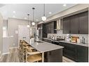 1121 Mahogany Boulevard Se, Calgary, AB  - Indoor Photo Showing Kitchen With Stainless Steel Kitchen With Double Sink With Upgraded Kitchen 