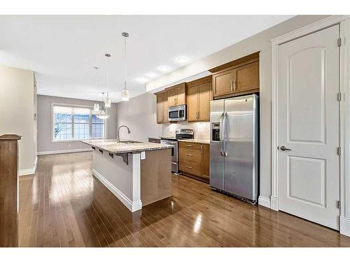 226 Quarry Park Boulevard Se, Calgary, AB - Indoor Photo Showing Kitchen With Stainless Steel Kitchen