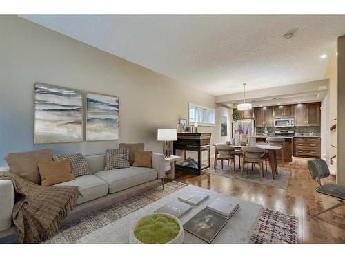 1-1927 32 Street Sw, Calgary, AB - Indoor Photo Showing Living Room