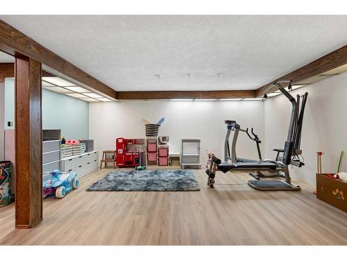 52 Lake Crimson Close Se, Calgary, AB - Indoor Photo Showing Gym Room