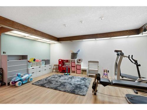 52 Lake Crimson Close Se, Calgary, AB - Indoor Photo Showing Gym Room