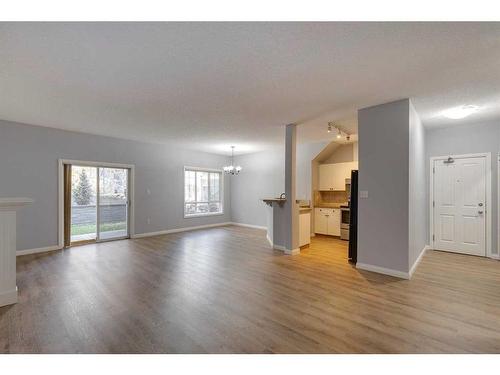 103-44 6A Street Ne, Calgary, AB - Indoor Photo Showing Living Room