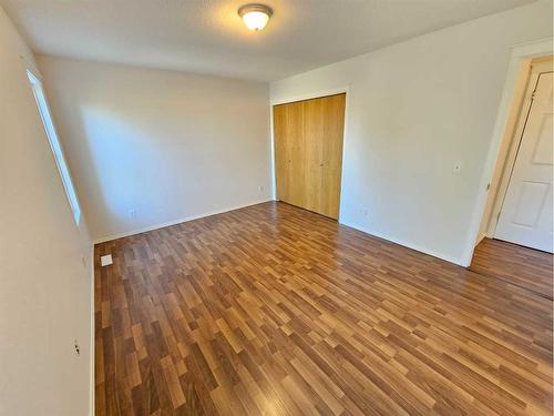 Unit #1-26 Quigley Drive, Cochrane, AB - Indoor Photo Showing Other Room