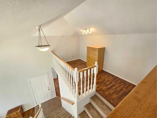 Unit #1-26 Quigley Drive, Cochrane, AB - Indoor Photo Showing Other Room