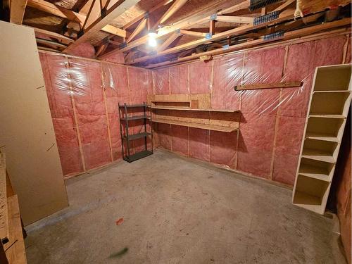 Unit #1-26 Quigley Drive, Cochrane, AB - Indoor Photo Showing Basement