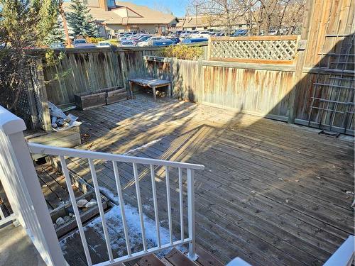 Unit #1-26 Quigley Drive, Cochrane, AB - Outdoor With Deck Patio Veranda With Exterior