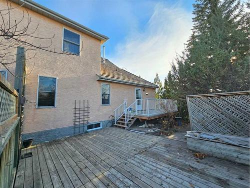 Unit #1-26 Quigley Drive, Cochrane, AB - Outdoor With Deck Patio Veranda With Exterior