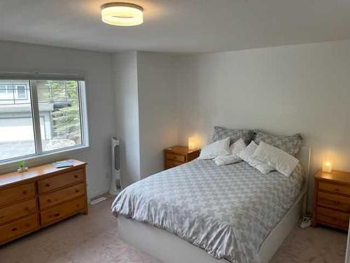 24-164 Rundle Drive, Canmore, AB - Indoor Photo Showing Bedroom