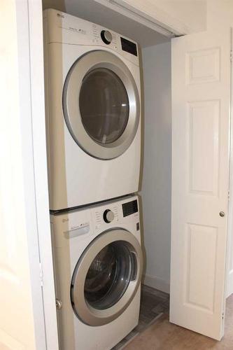 24-164 Rundle Drive, Canmore, AB - Indoor Photo Showing Laundry Room