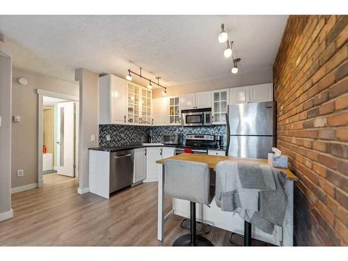 8-2902 17 Avenue Sw, Calgary, AB - Indoor Photo Showing Kitchen With Stainless Steel Kitchen