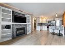 8-2902 17 Avenue Sw, Calgary, AB  - Indoor Photo Showing Living Room With Fireplace 