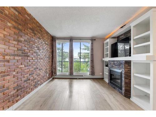 8-2902 17 Avenue Sw, Calgary, AB - Indoor With Fireplace