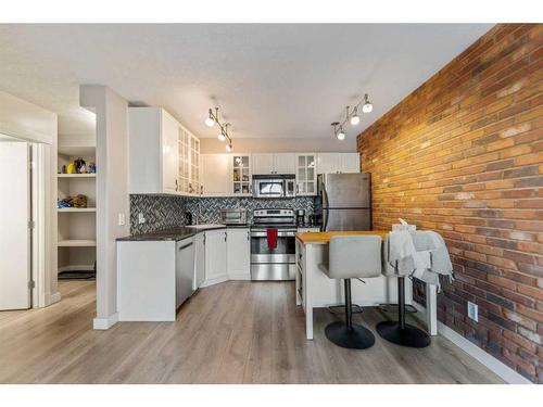 8-2902 17 Avenue Sw, Calgary, AB - Indoor Photo Showing Kitchen With Stainless Steel Kitchen